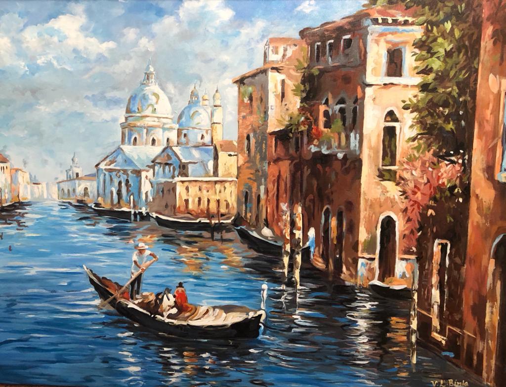 A gondola moving along a Venice canal