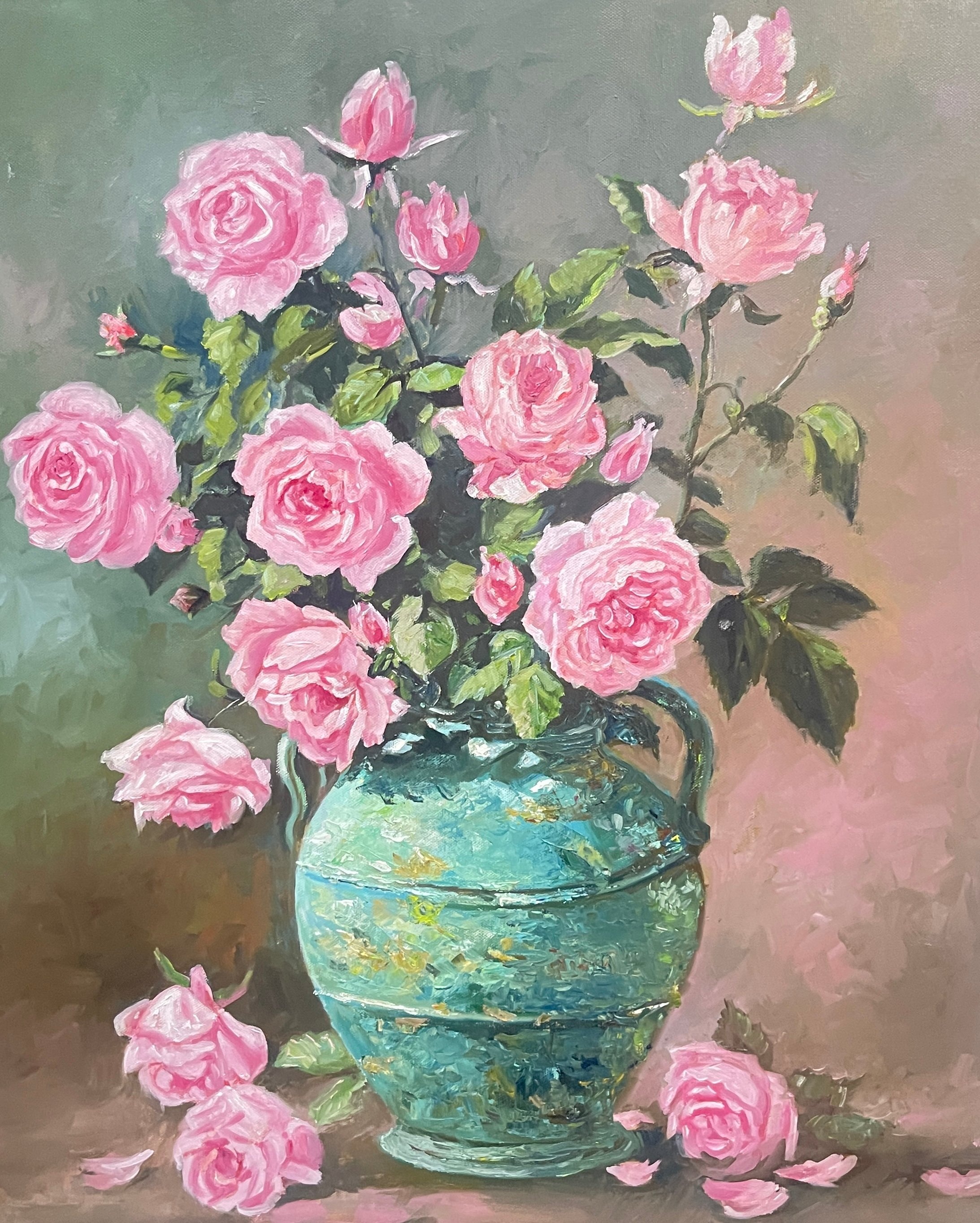 Bouquet of pink roses arranged in a turquoise vase